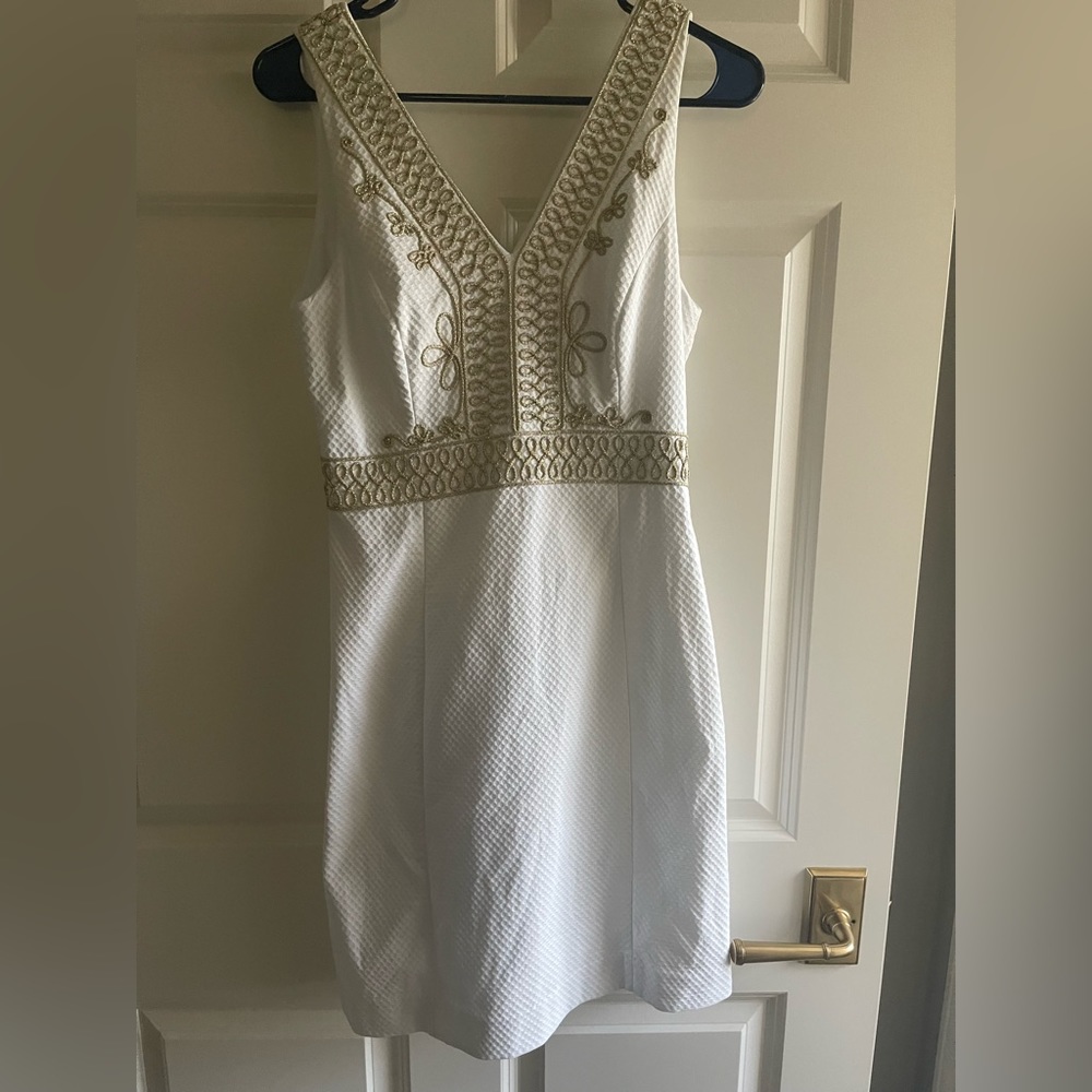Lilly Pulitzer size 4 white fitted dress  with gold brocade stitching. Worn once